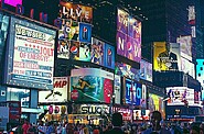 New York square bustling with large LED advertisements on buildings and billboards, illuminating the area.