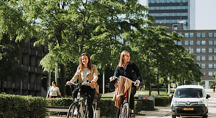 Students biking on campus