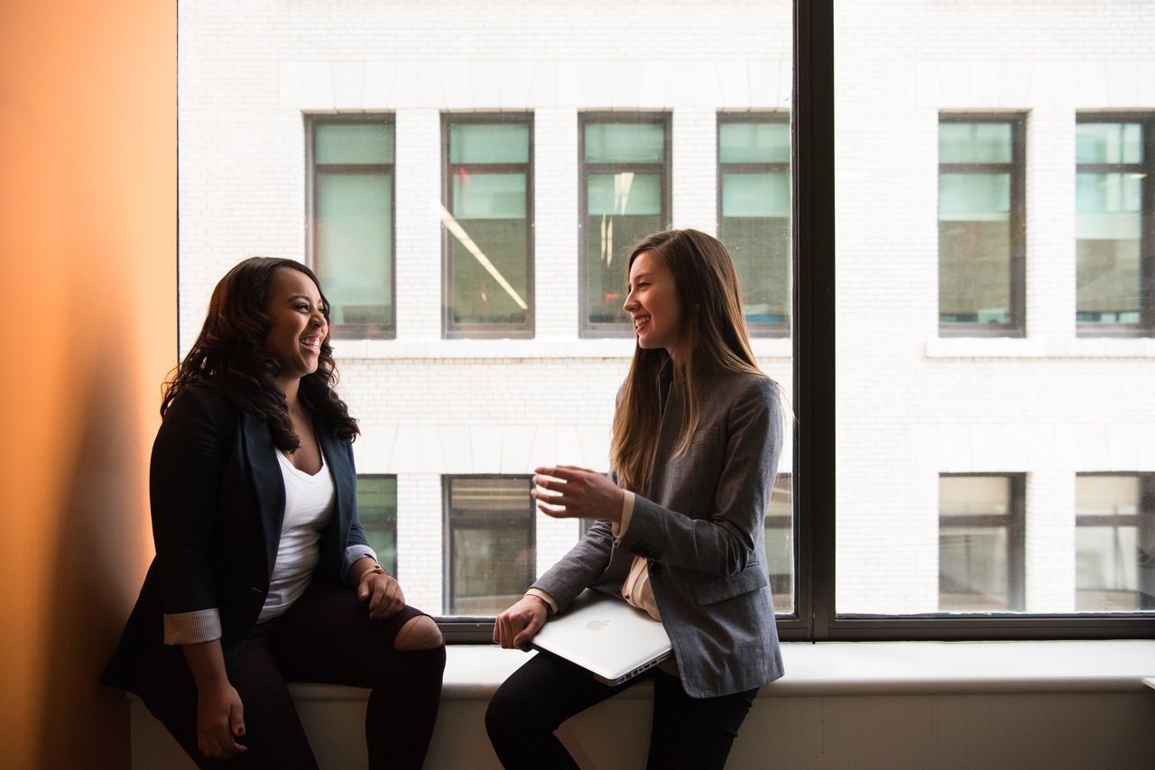 Two women talking to each other