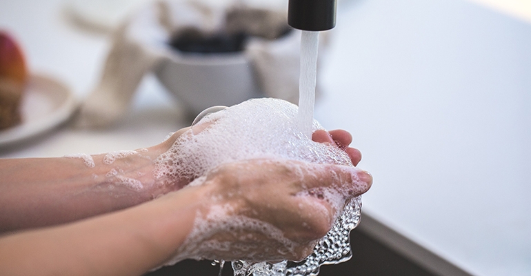 A person washing his hands