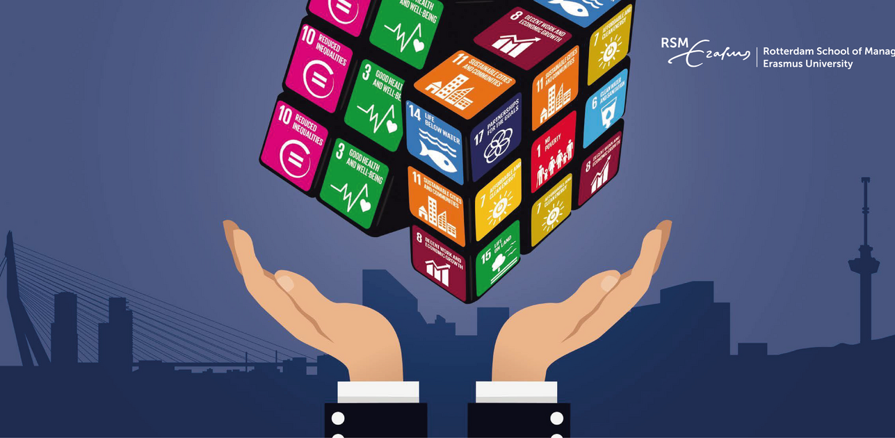 A Rubik's cube with UN Sustainable Development Goals icons floating above two hands, with a city skyline in the background.