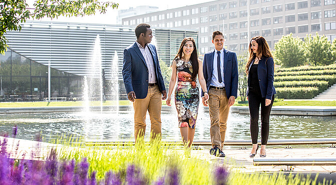 EMBA students walking on campus