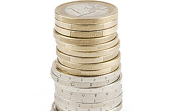 A stack of one and two euro coins on top of each other
