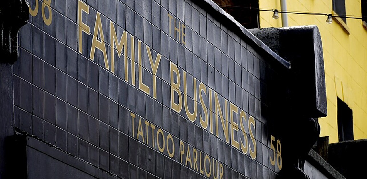 Store sign stating Family Business.