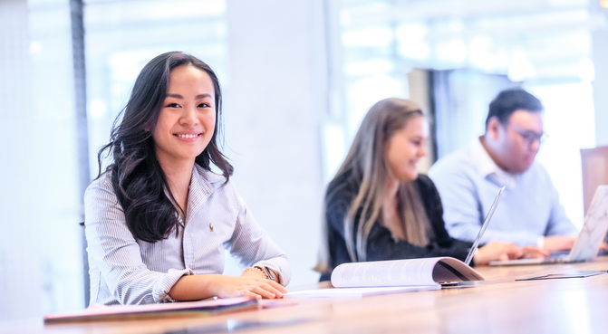 smiling student in rotterdam school of management
