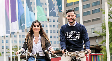 Students cycling on campus