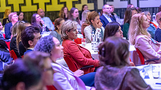 The audience observes thought-provoking presentations at ECWO conference