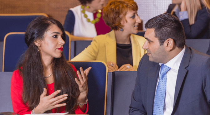 students discussing in class