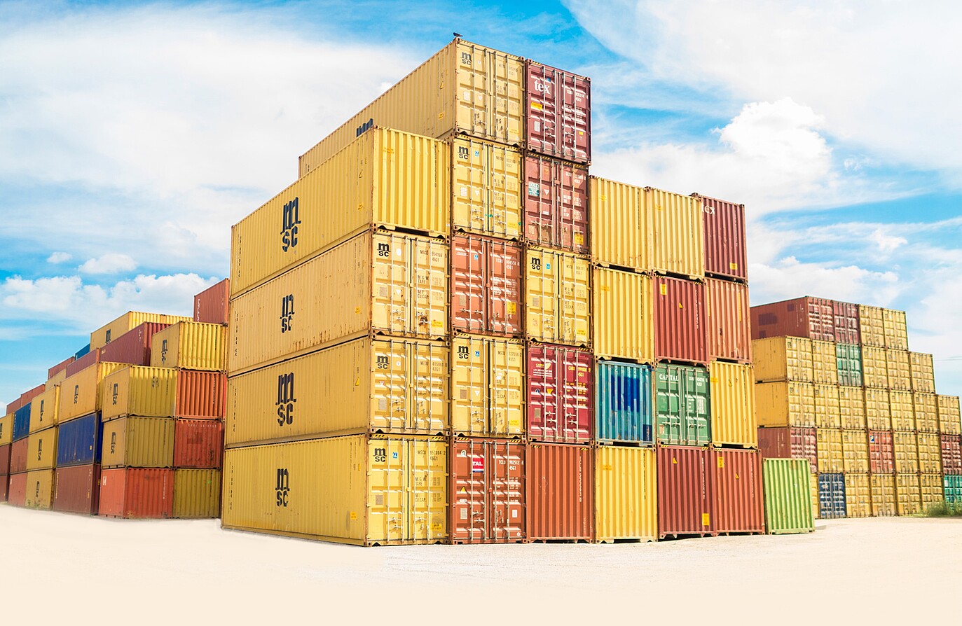 stacked containers on the ground