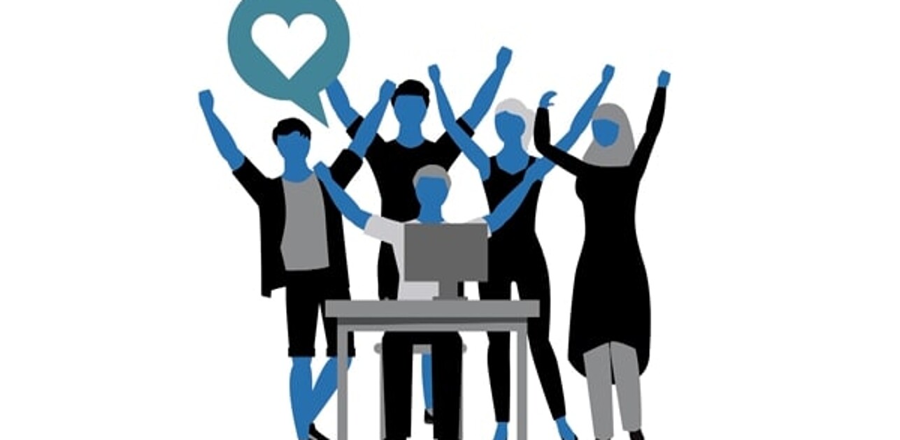 Cartoon figures celebrating in front of computer