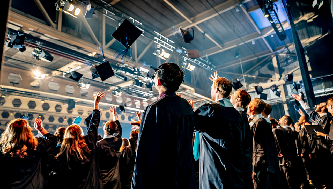 students at graduation event