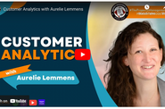 Image shows a presentation slide of Aurelie Lemmens presentation on customer analytics