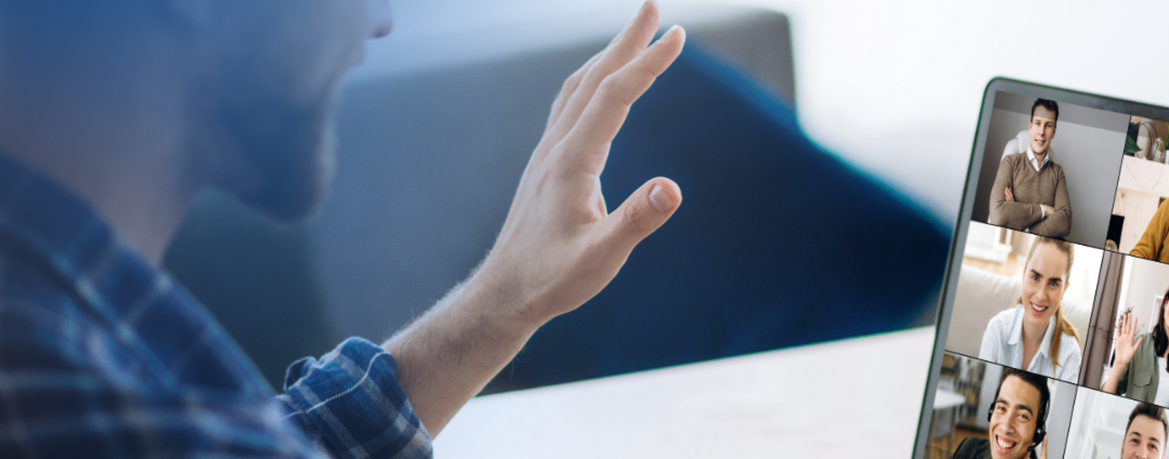 Master’s student participating and interacting in an online class lecture by raising his hand.