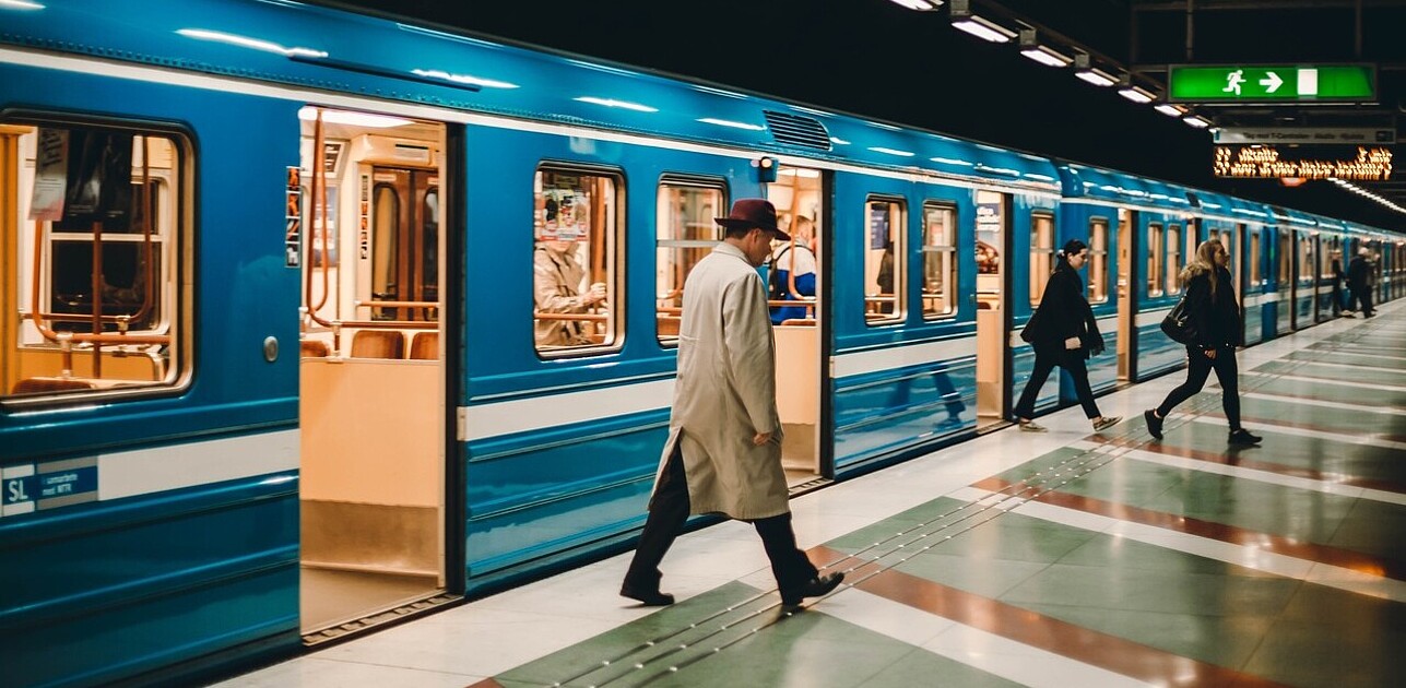 People walking out of a metro