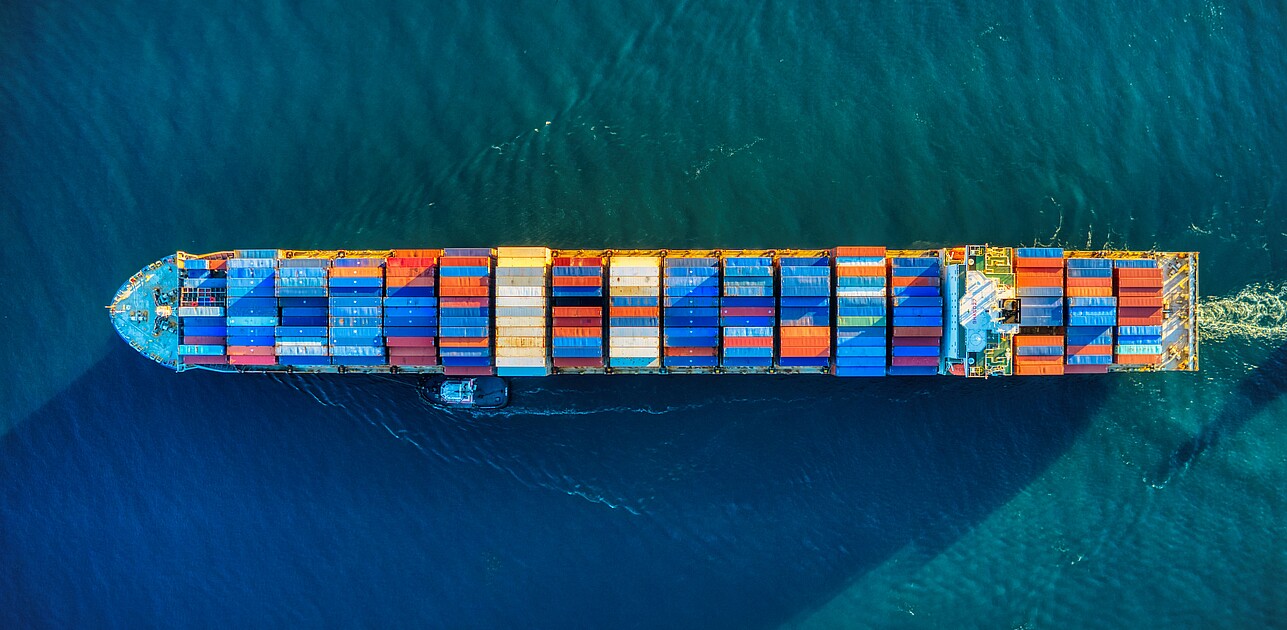 Large containership in the water from above