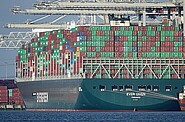 an enourmous container ship with thousands of containers