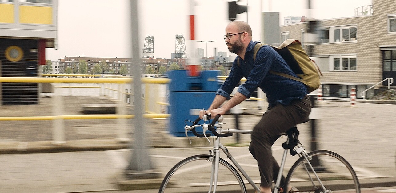 Guy driving a bicycle