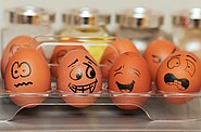 eggs with different faces painted on them