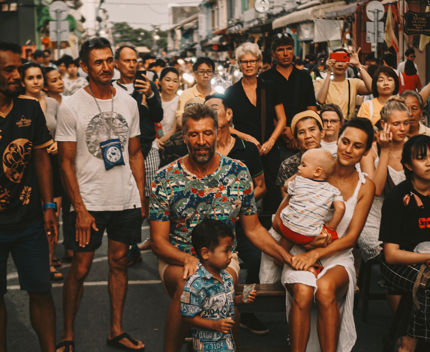 An image shows a lot of people walking on the street