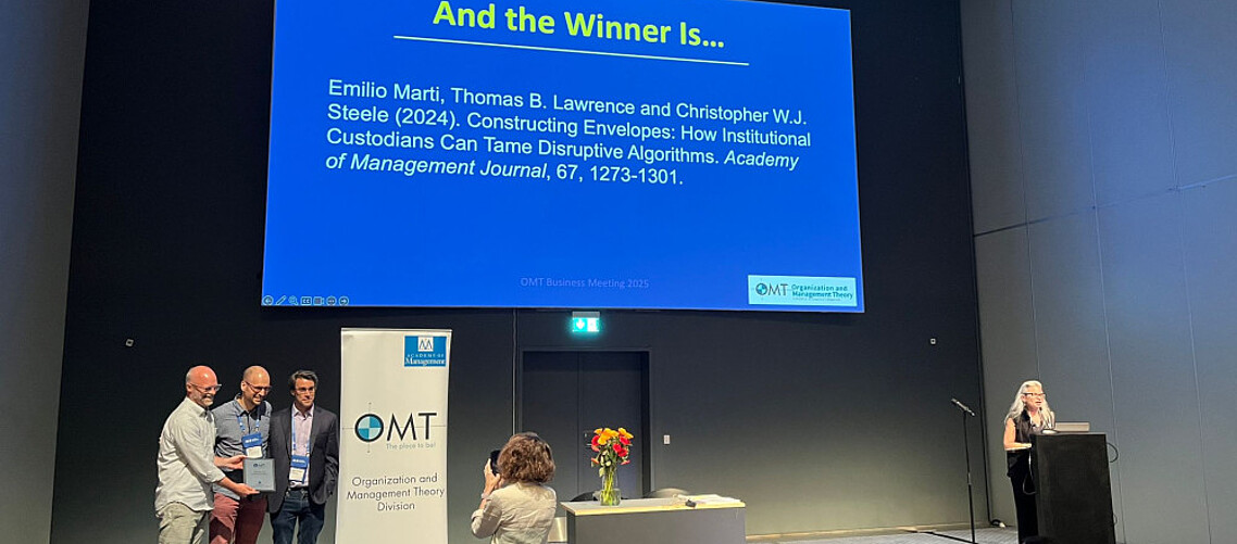 Dr Emilio Marti, Prof. Tom Lawrence, Dr Chris Steele accept AOM OMT Best Published Paper Award