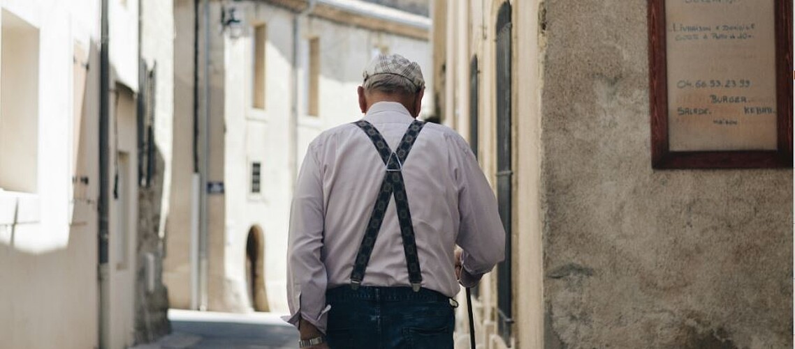 Pensioner, walking away