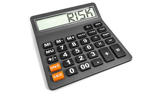 A calculator showing the word risk